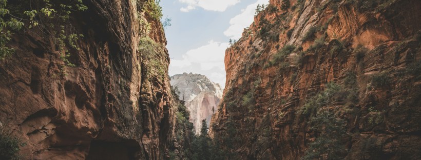 A canyon forms a vee shape of sky.